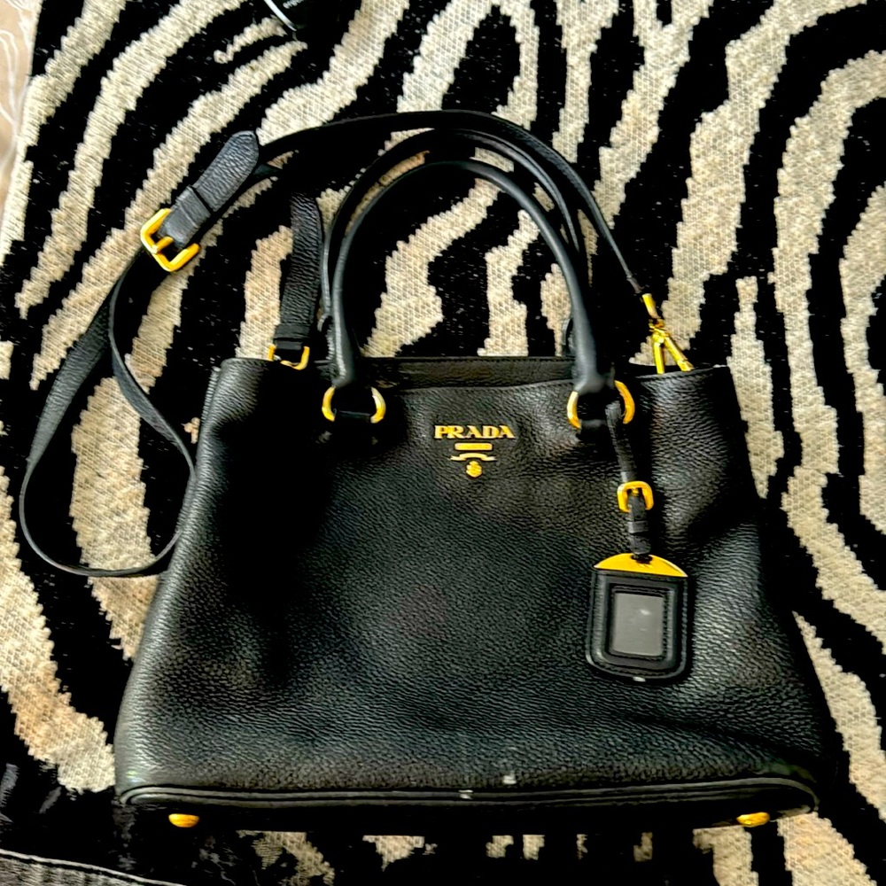PRADA medium sized leather handbag with long shoulder strap.